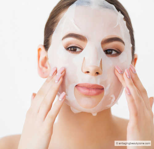 Woman wearing a sheet face mask.