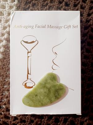 The Gua Sha I use and the box set it came in.